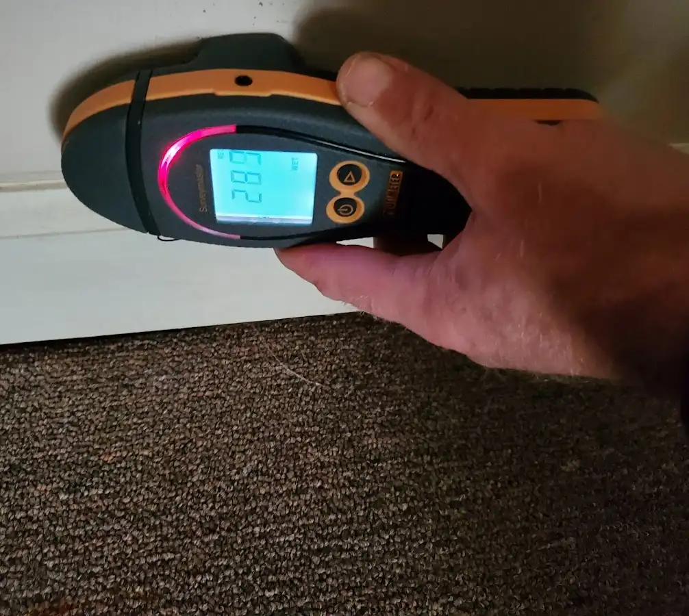 Moisture detection at baseboard during Storm Damage Restoration in Camp Pendleton Mainside